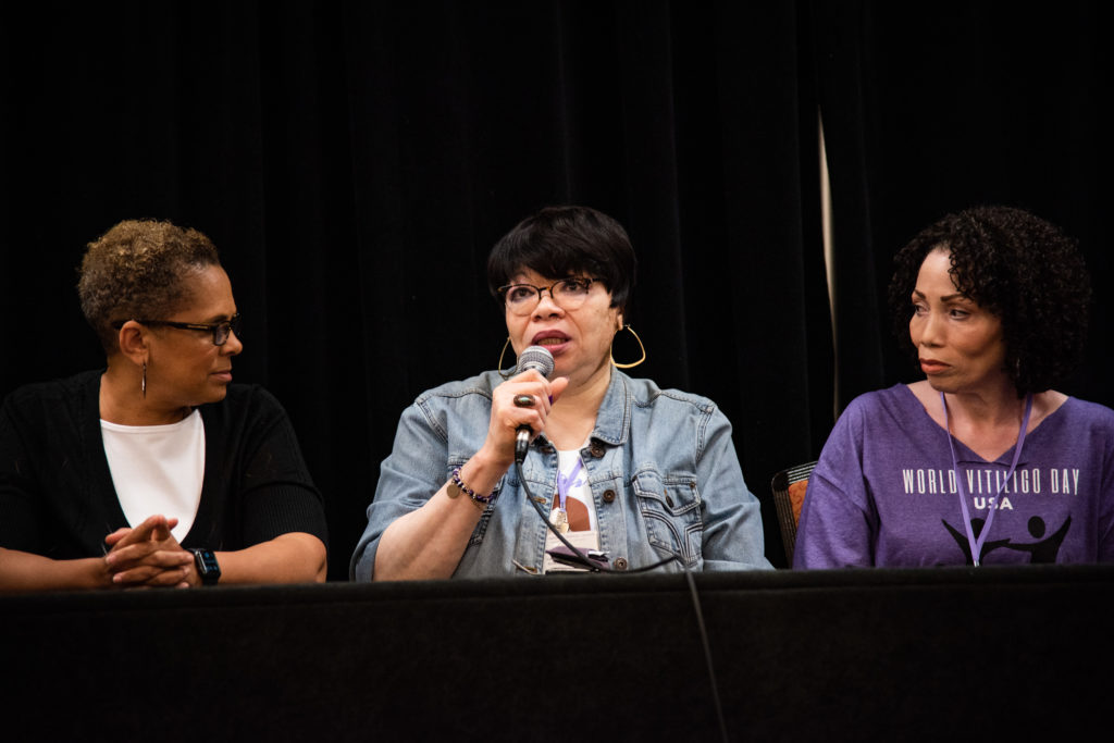 Panel of women with vitiligo at a conference