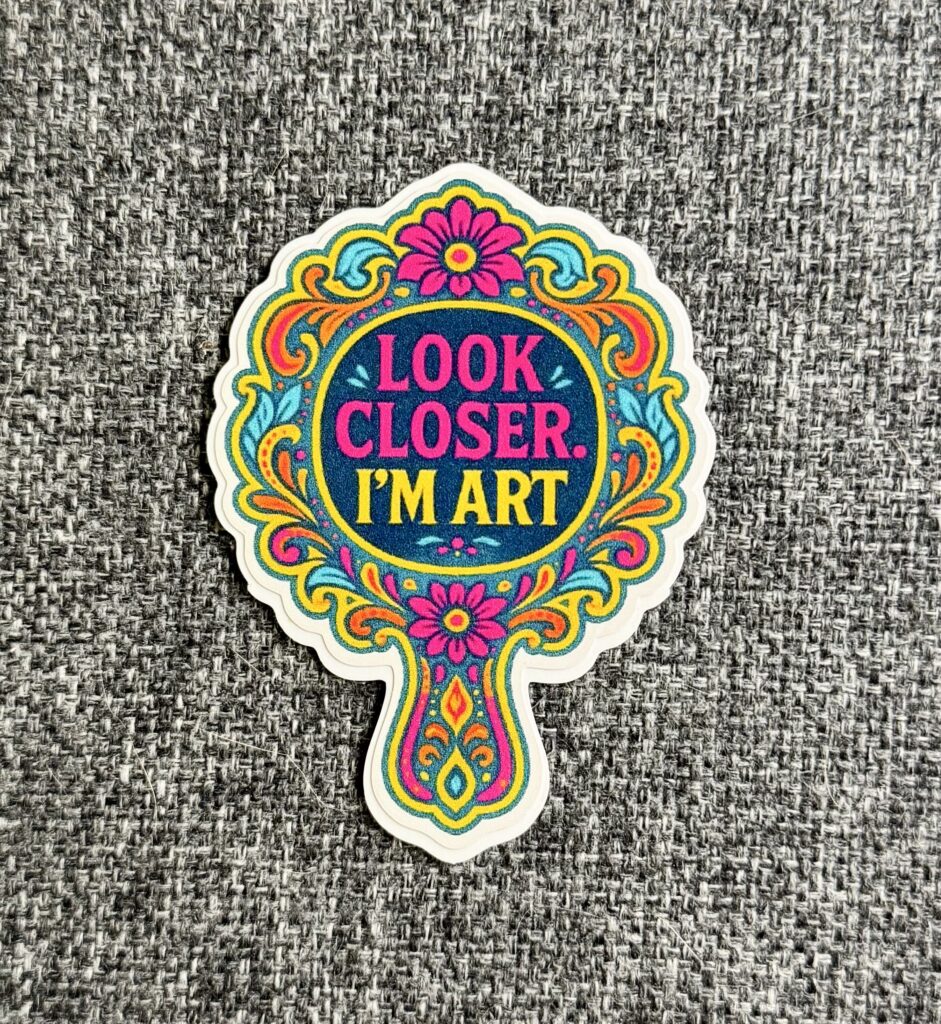 Sticker with the text "Look closer. I'm art."